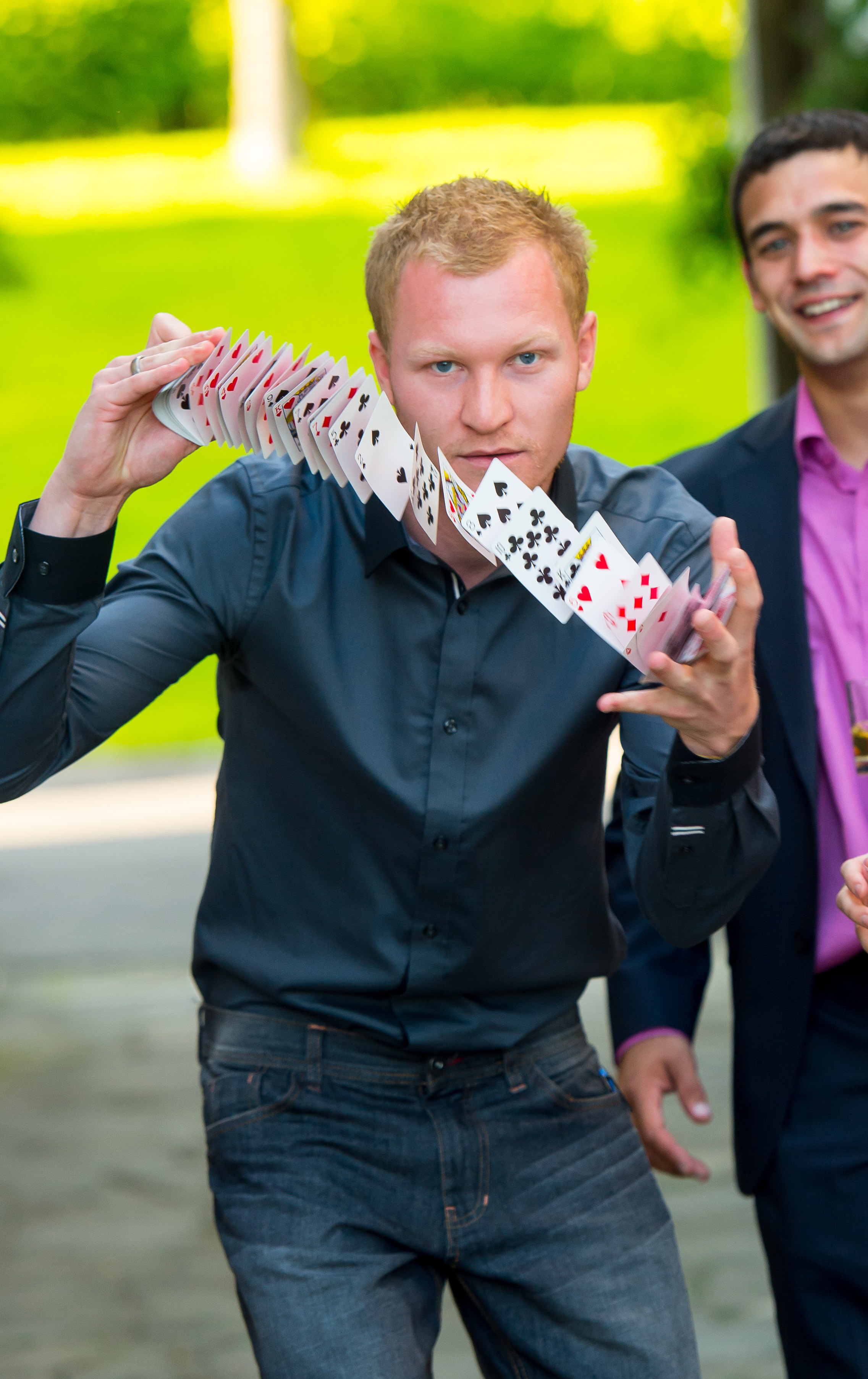 Street Magician Liam Walsh performing close up magic at Private Wedding in East Grinstead